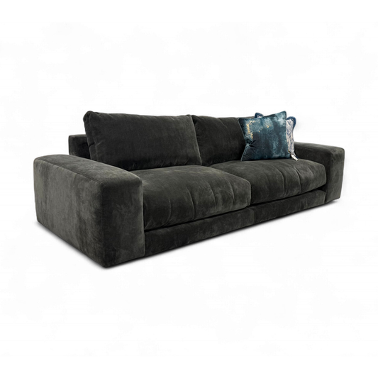 Frontal view of the Swoon 'Denver' sofa, showcasing its modern English arm style, deep seating, and solid grey color.