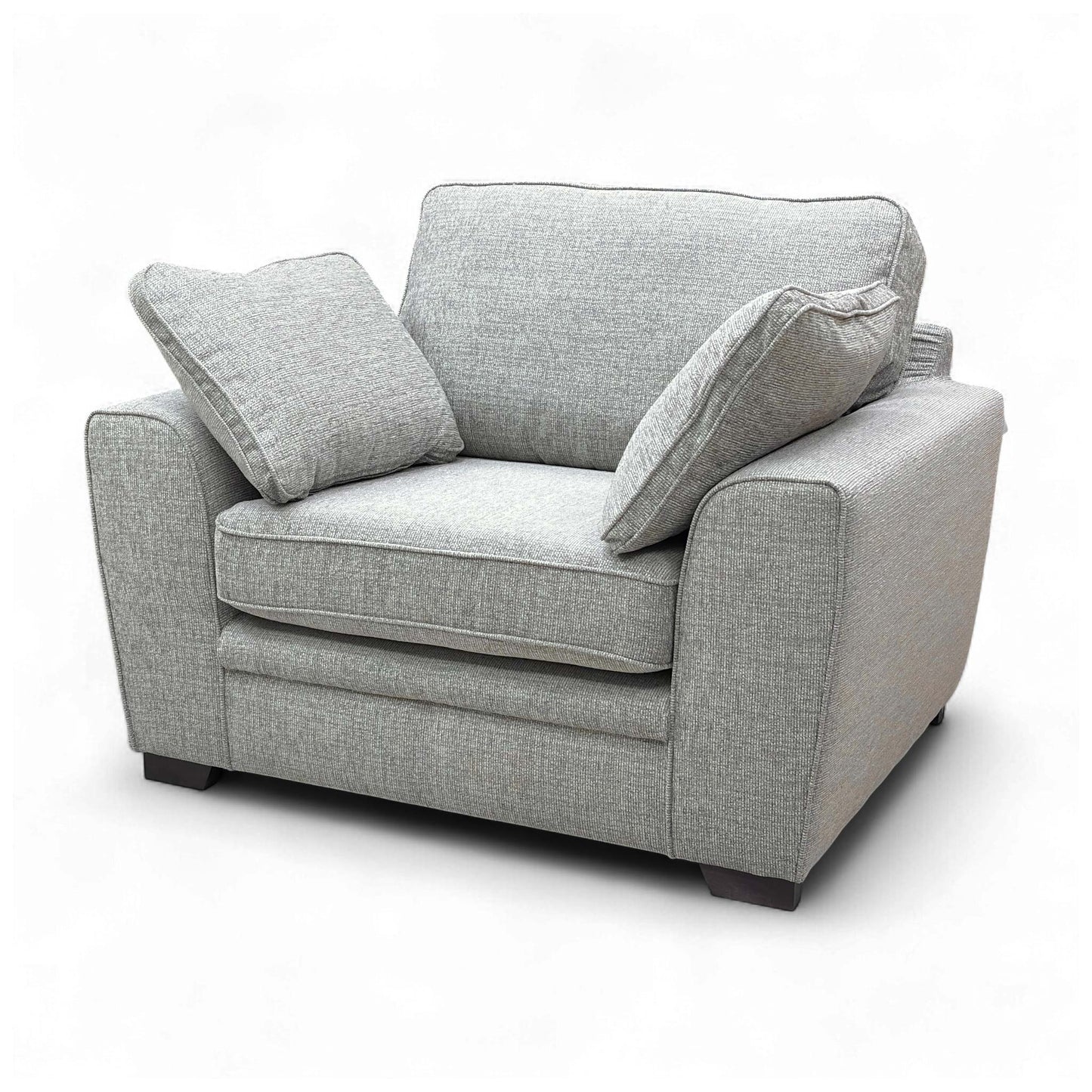 Angled view of the armchair from the back/side, showing its overall profile and depth.