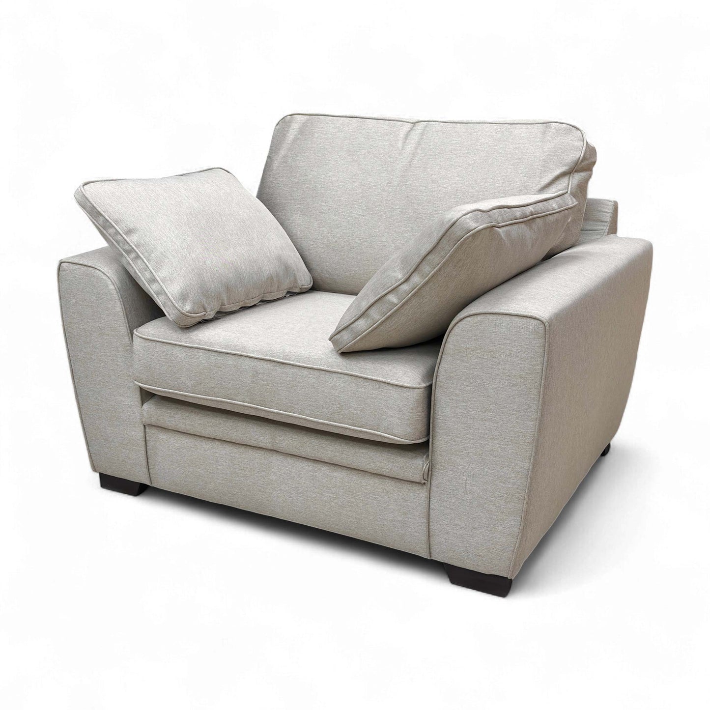 Side view of the armchair, displaying its overall depth and the gentle slope of the armrests.