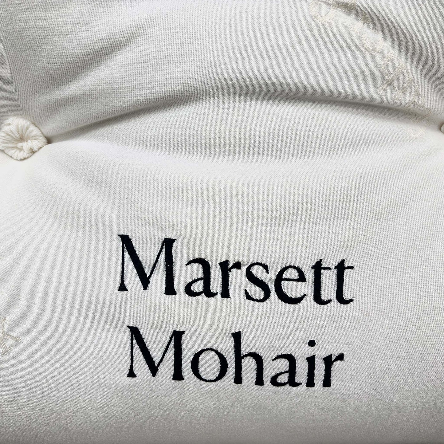 Angled view of the Harrison Spinks Marsett Mohair King Mattress, showcasing its height (35 cm) and luxurious profile on a bed base.