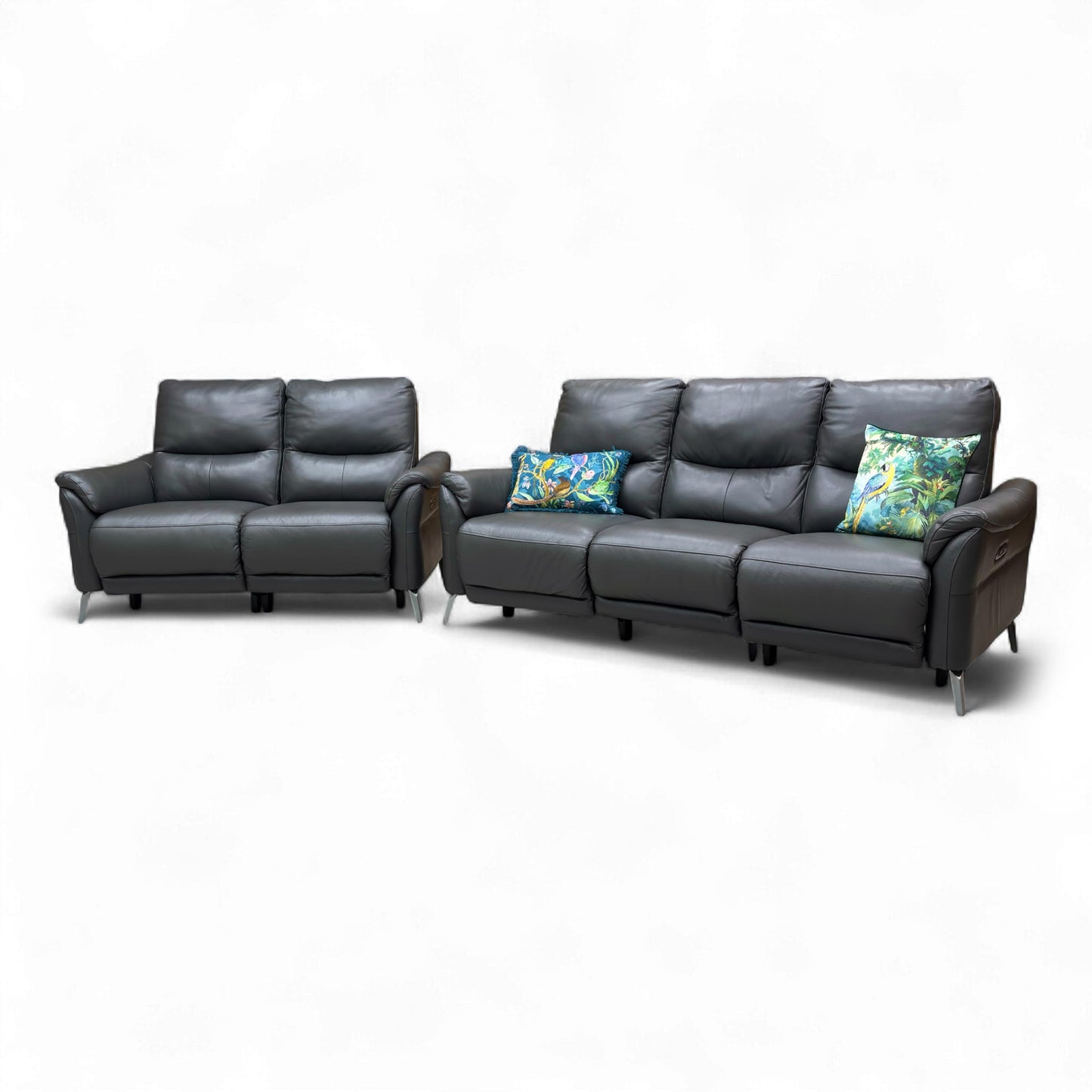 Angled view of the sofa set, showing the stylish modern silhouette and gentle curves of the armrests.