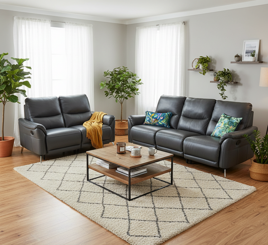 Modern living room with gray sectional sofa, wooden coffee table, and decorative plants.