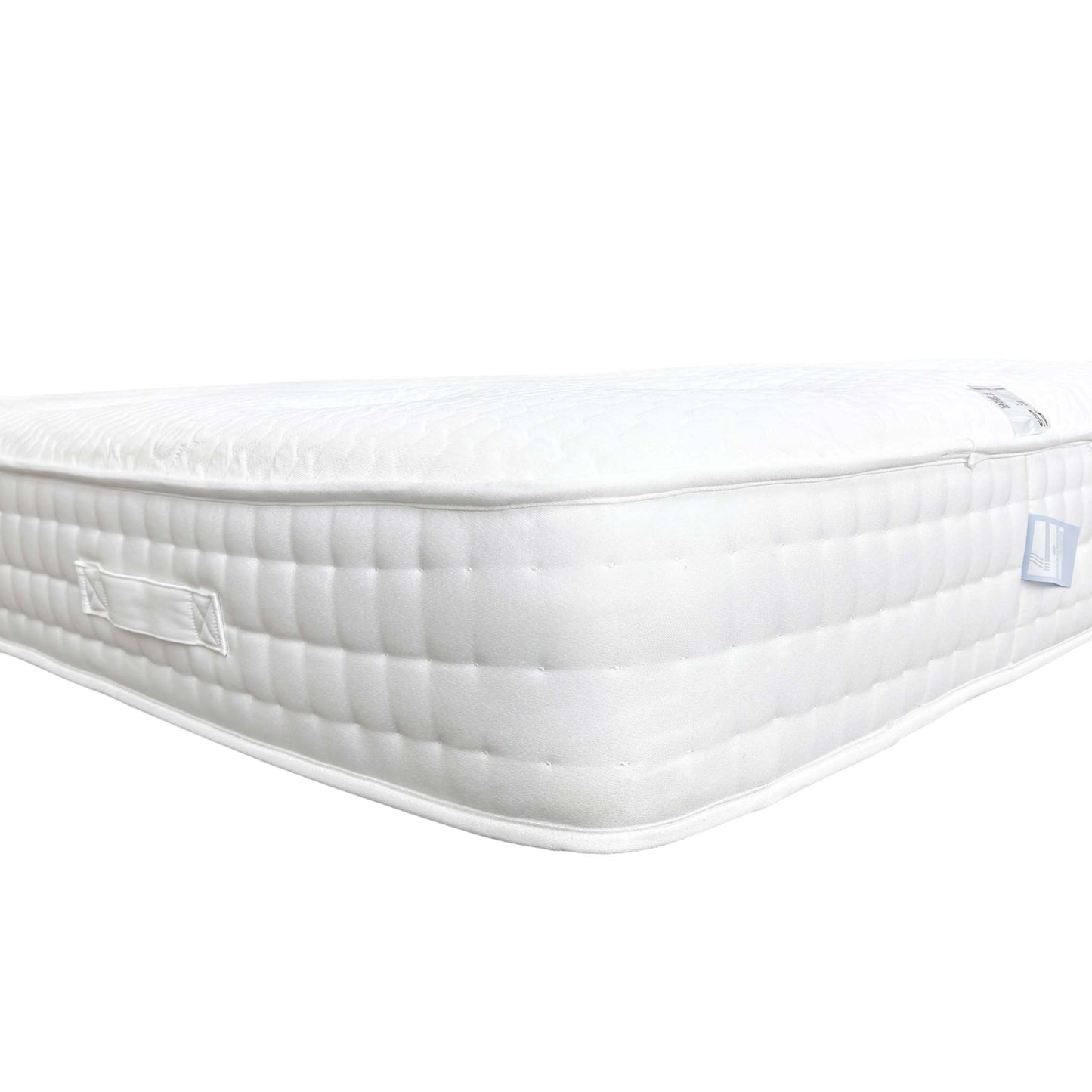 Side Close-up of the hand-tufted surface of the Hypoallergenic Mattress, emphasizing the texture of the breathable stretch fabric.