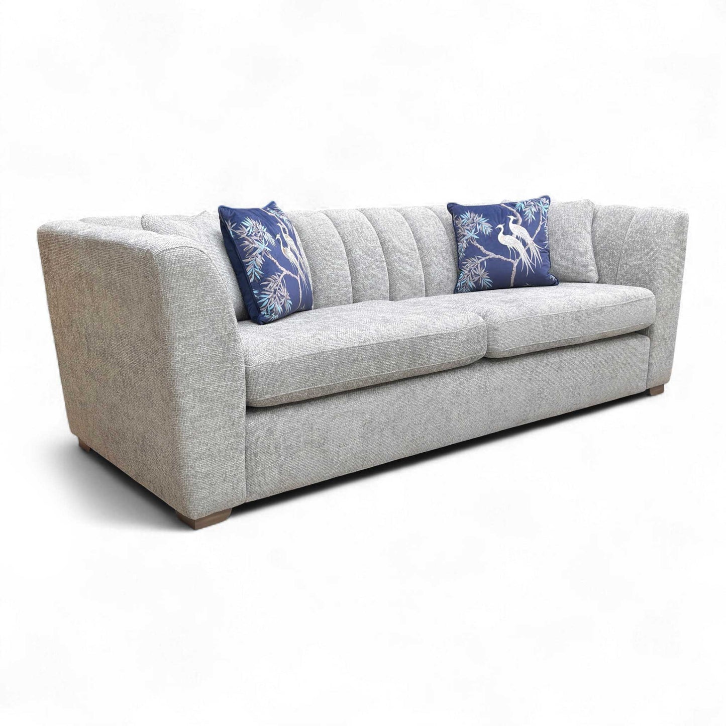 Sofa in a styled room setting / Angled view.