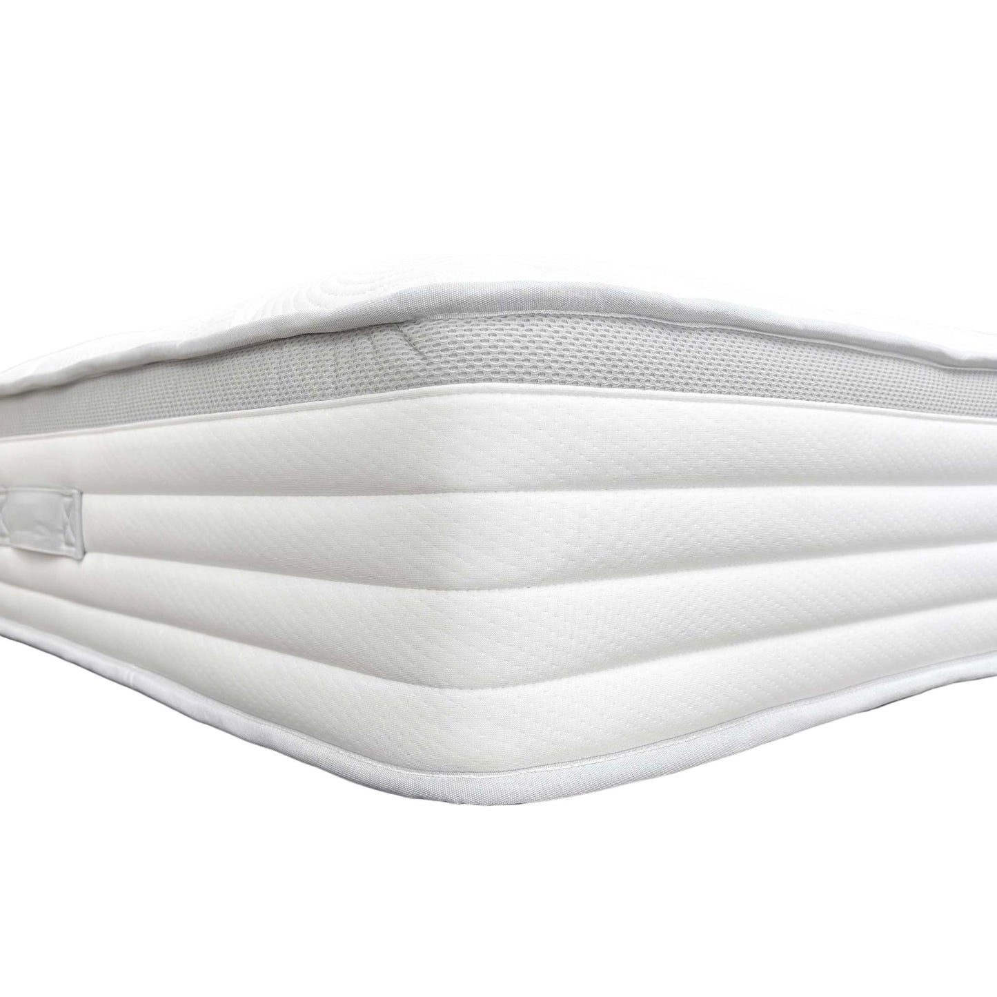 Detail shot of the breathable fabric cover and solid white color of the Medius 1500 Pocket Sprung King Mattress.