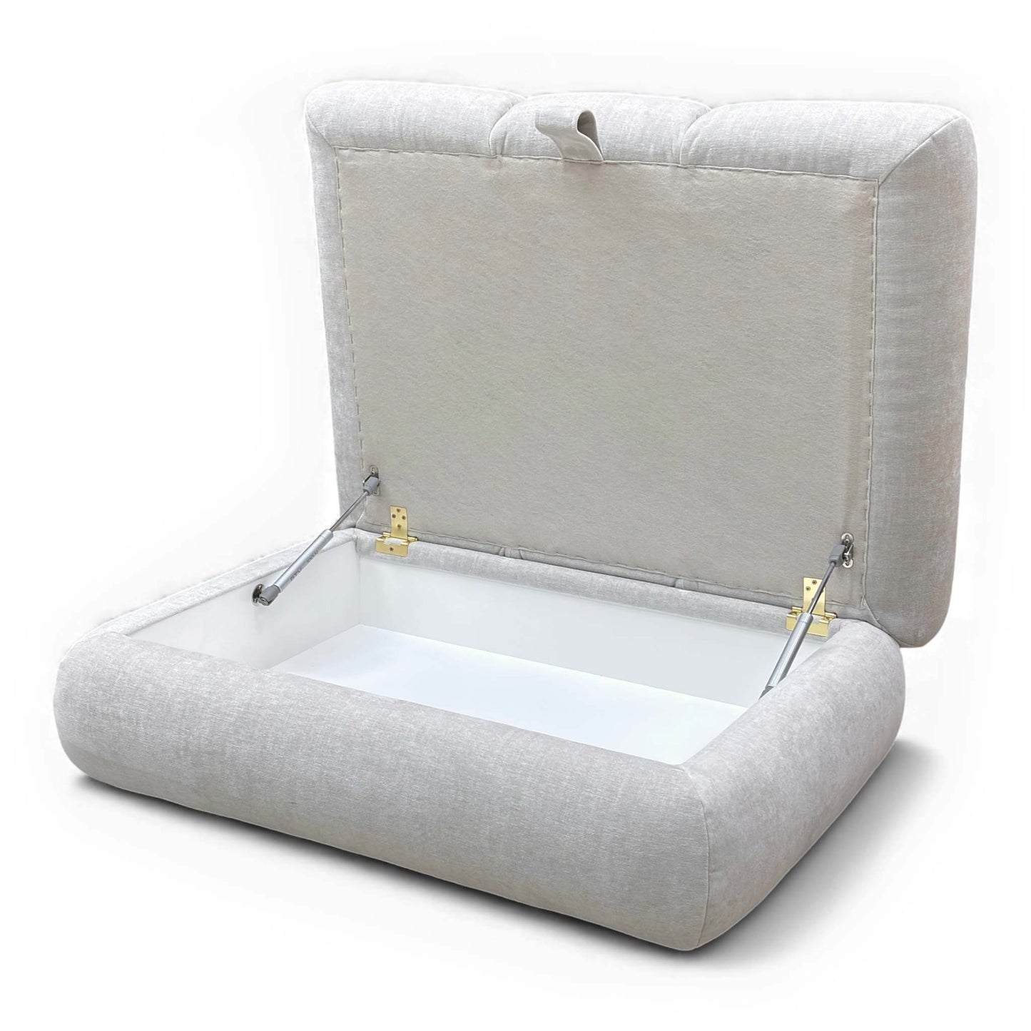 View of the footstool with the lid open, revealing the storage space.