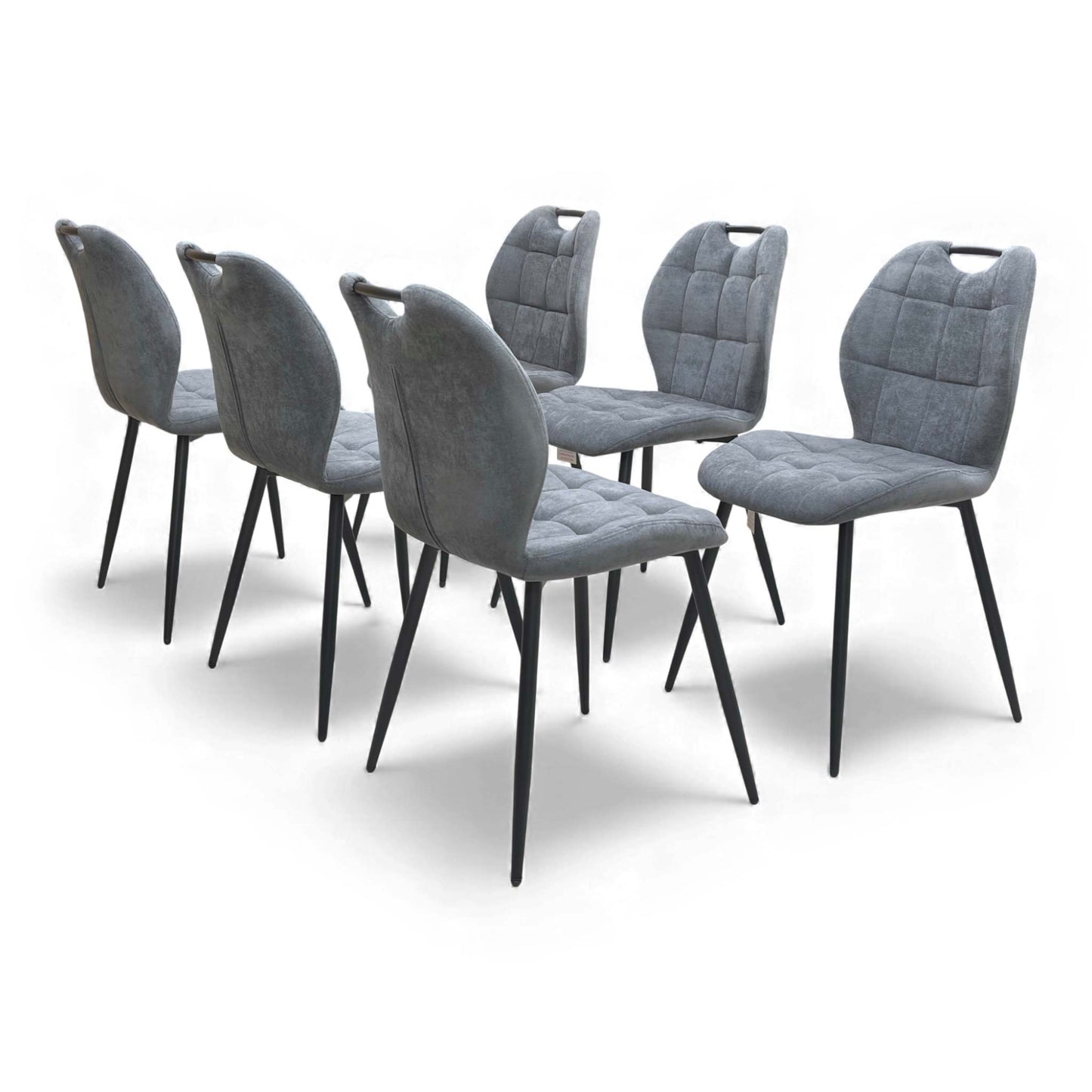 View of the backs of the Alva Charcoal Grey Dining Chairs.