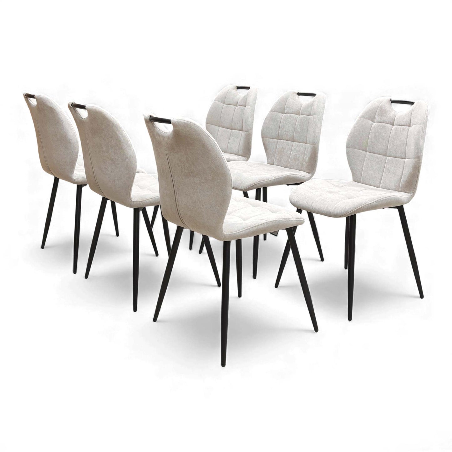 View of the backs of the Alva Beige Dining Chairs.