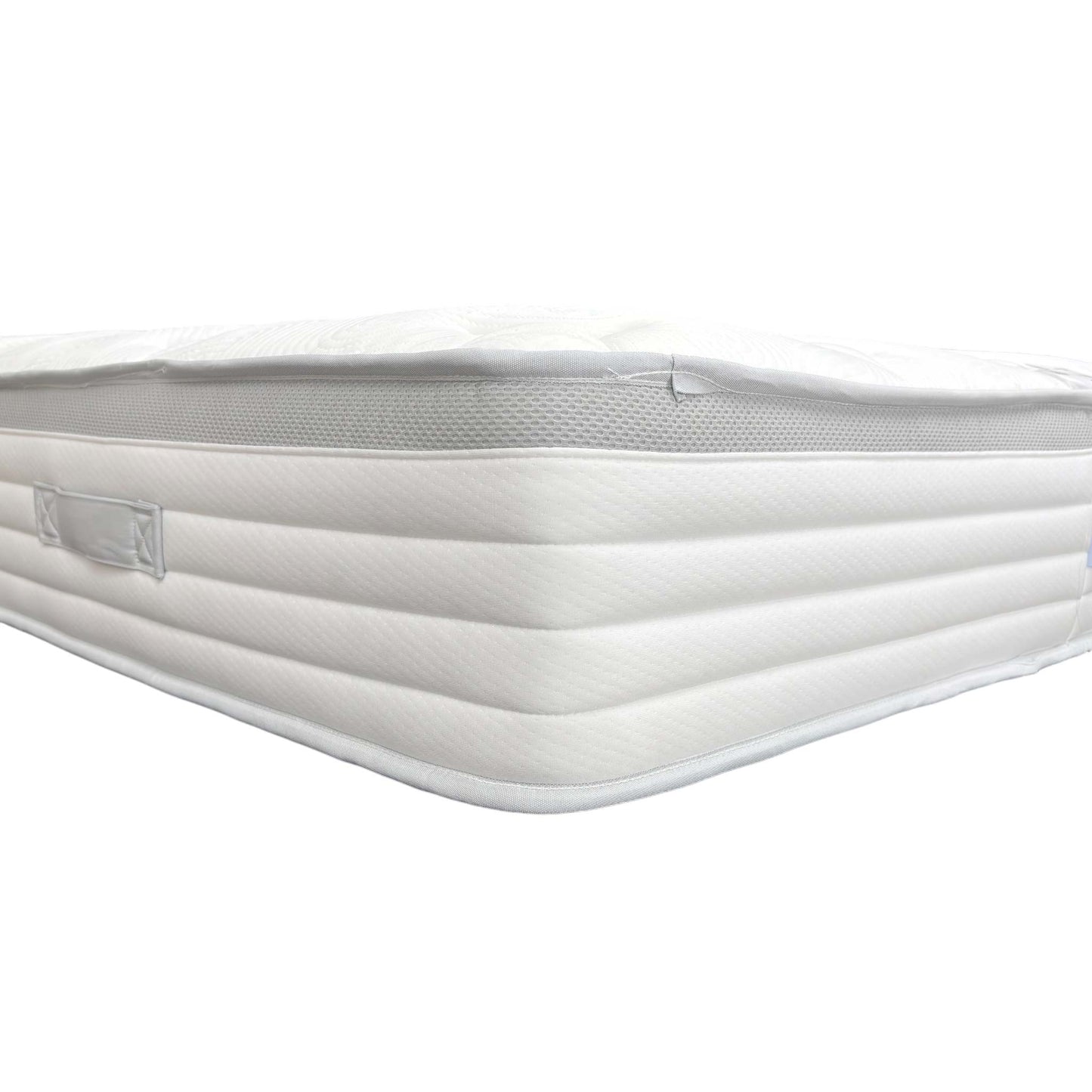 Close-up of the product label on the mattress side, detailing its features and Medium Tension.