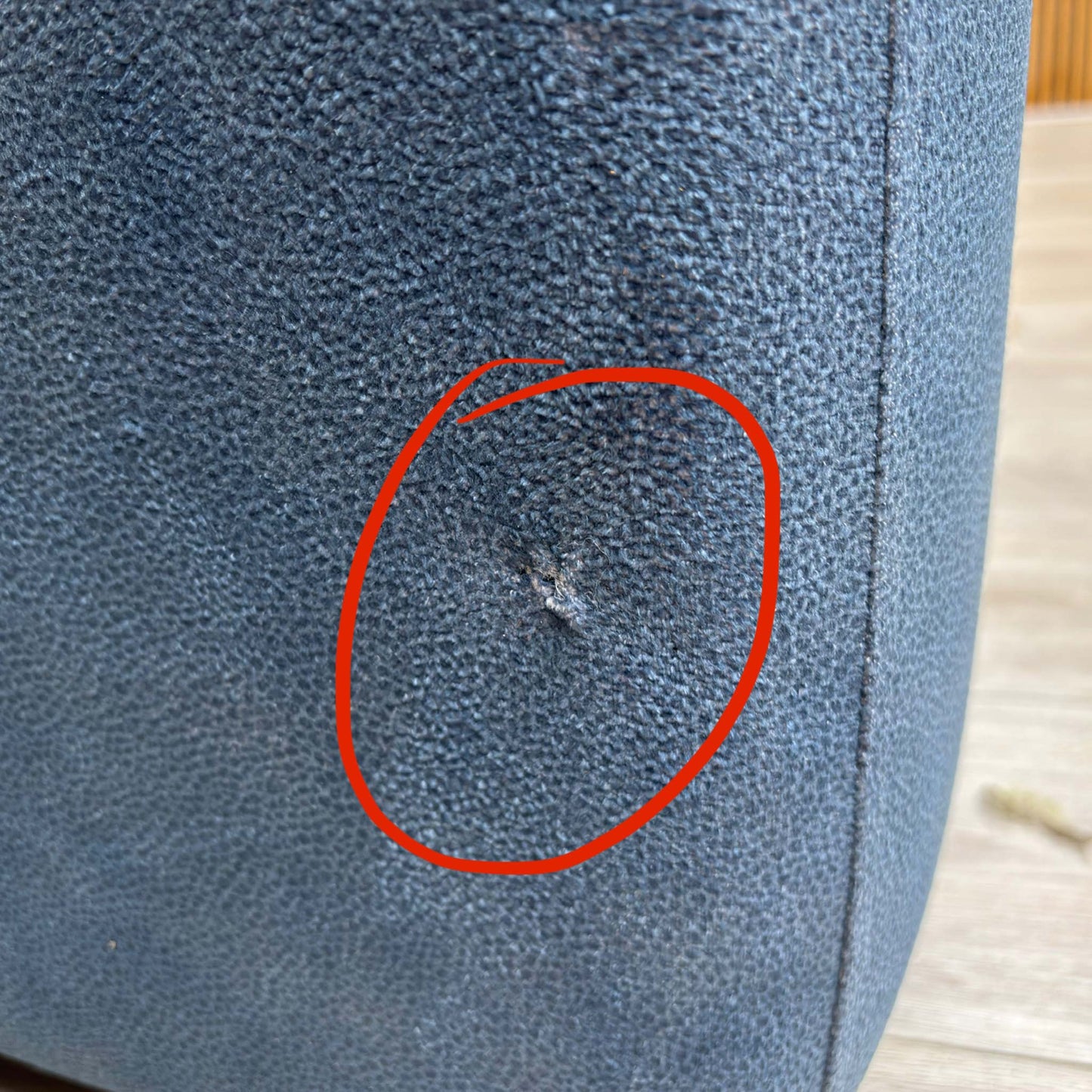 Close-up image highlighting the damage on the G Plan Thornbury recliner chair (as noted in description).