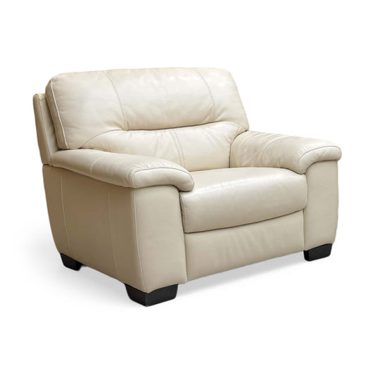 Full View Furniture Village World of Leather ‘Hetty’ contemporary armchair, meticulously tailored in premium 100% bisque beige leather upholstery.