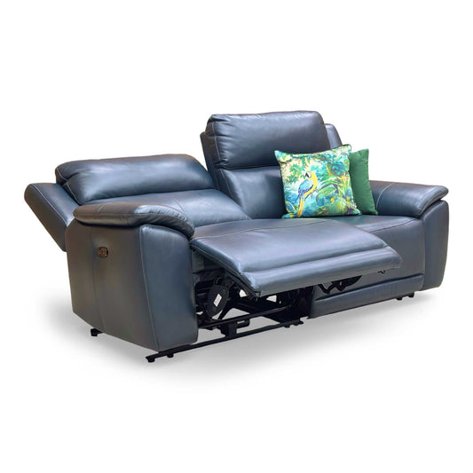 Front view of the Furniture Village ‘Utah’ 3 Seater Power Recliner Sofa in Natural Milled Navy Leather, featuring modern lines and "smile" seat stitching.