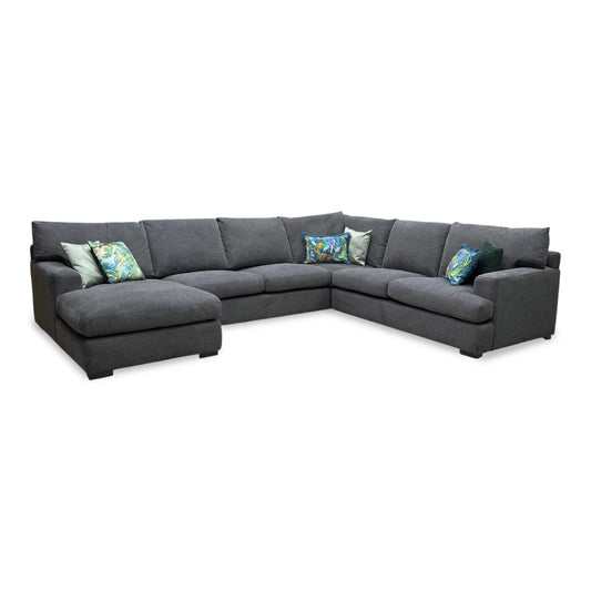 Full view of the charcoal fabric sofa, highlighting the wide seating area, plush cushions, and contemporary silhouette.