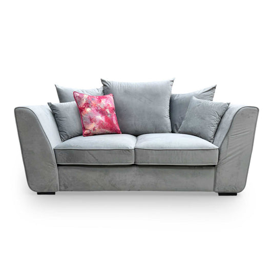 Front view of the Very 'Cairo' 2-seater scatter back sofa, upholstered in plush grey velvet.