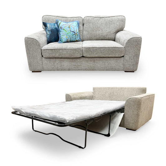 Full view of the 'Emilia' 2-seater sofa bed in silver fabric, featuring a clean, contemporary design with tapered wooden legs.