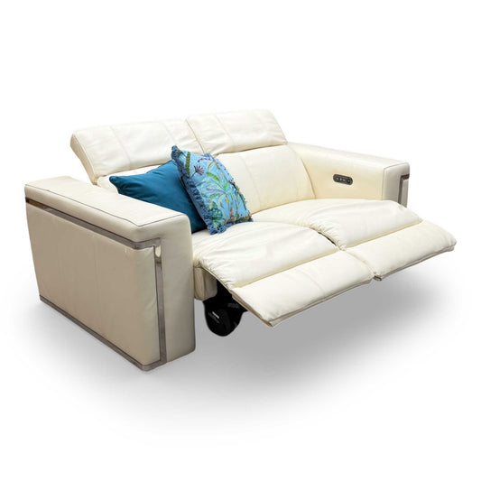 Front view of the Fabb 'Cora' 2-seater power recliner sofa in premium white leather, featuring sleek chrome legs and adjustable power headrests for modern comfort.