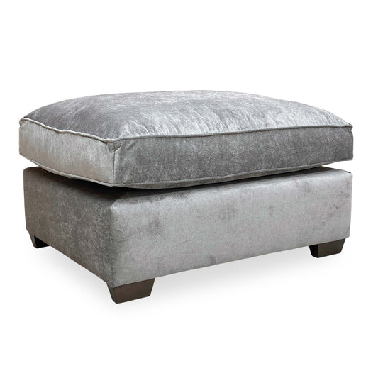 Full view of the ‘Rosie’ Kingston Grey Fabric Footstool featuring a sleek, rectangular design and plush cushioning.