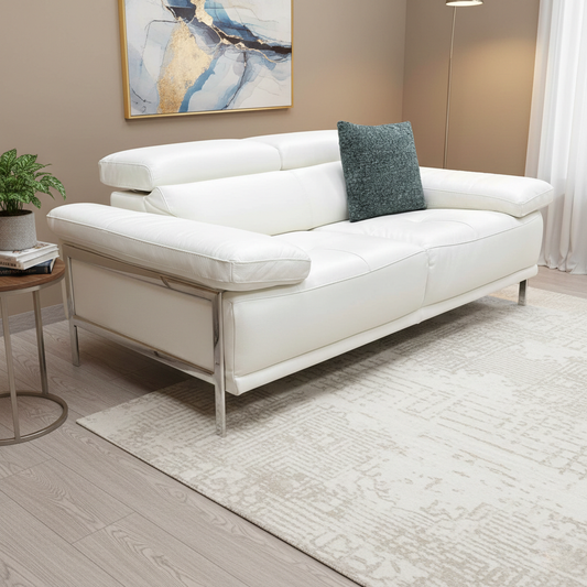 Living Room view of the white leather 2-seater sofa, highlighting its sleek Italian design and low profile.