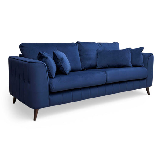 Full front view of the Sofology ‘Remy’ 4 Seater Sofa in vibrant Royal Blue Super Matt Velvet, featuring a sleek mid-century modern design.