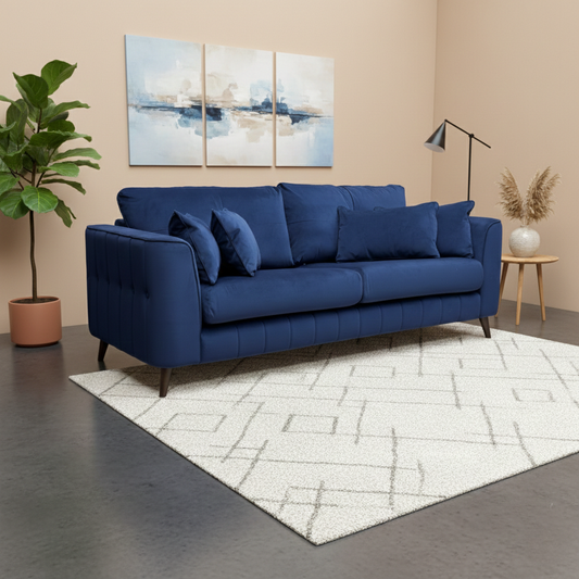 Living room of the Sofology ‘Remy’ sofa, highlighting its premium matt velvet upholstery and modern English arm style.