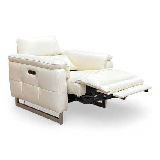 The Furniture Village ‘Moet’ power recliner chair in Cotton White leather, featuring a sleek modern design with a telescopic headrest and silver metallic U-shaped legs.