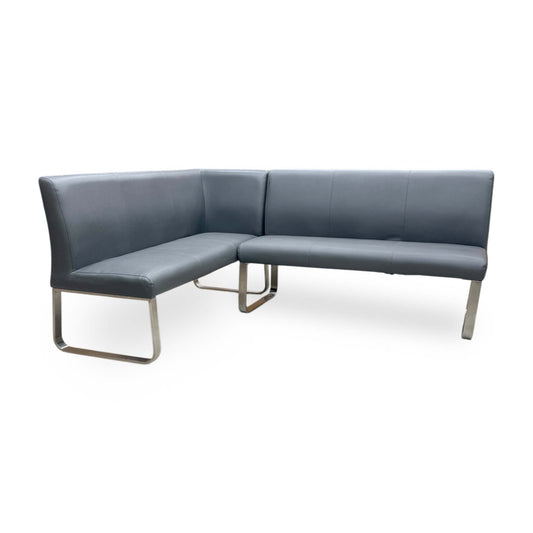 Full view of modern Cocoon left-hand facing corner bench upholstered in soft, wipe-clean grey faux leather.