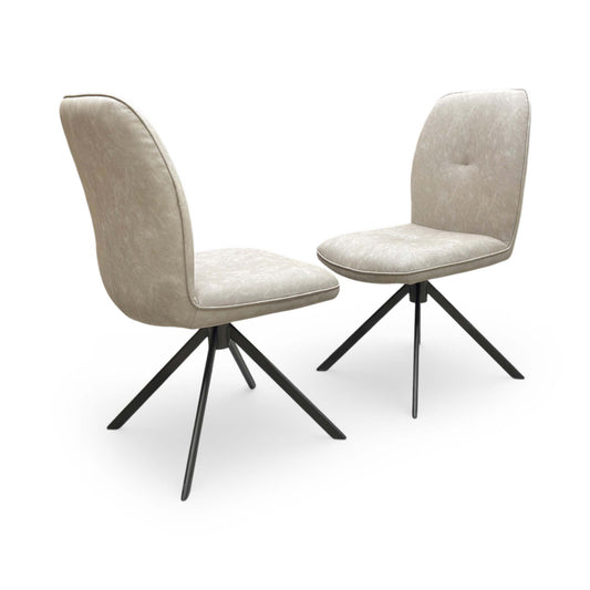 Full view of Set of two Perla neutral upholstered dining chairs featuring a stone fabric finish and dark bronze metal legs.