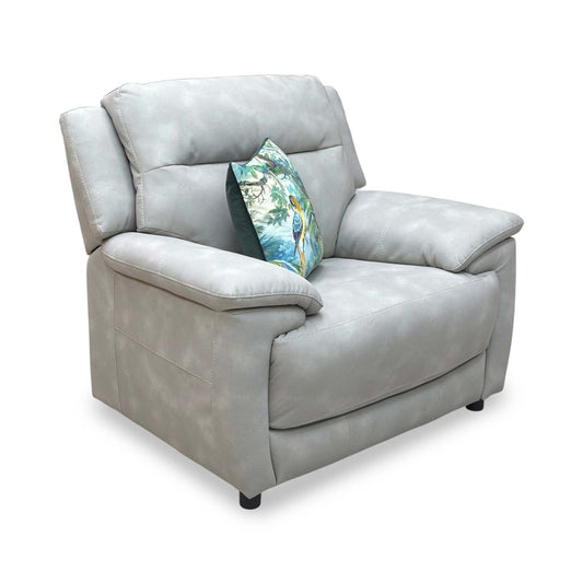 Full view of the ‘Touch’ armchair in Beige Grey heavy-duty fabric, featuring a modern low-profile design with deep, oversized cushions and sleek dark metal feet.