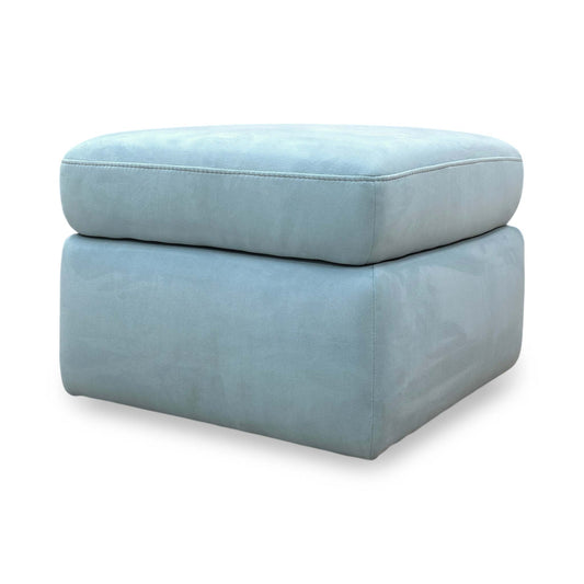 Full view of a rectangular Cinemax storage footstool upholstered in soft baby blue velvet with a clean, contemporary design.