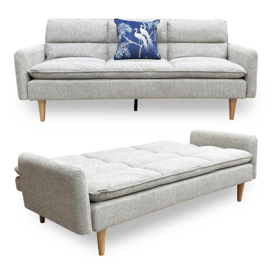 Full view of the 'Chill' 3-seater click-clack sofa bed in Natural fabric, featuring a minimalist Scandinavian design, clean vertical stitching, and light wood tapered legs.