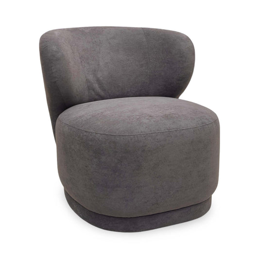 Full View DFS ‘Mazetti’ accent armchair upholstered in soft Palmero plain fabric in a warm, neutral praline brown color tone.