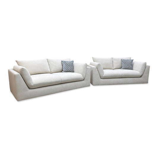 Kalista cream velvet 3 and 2 seater sofa set with grey patterned scatter cushions, studio shot