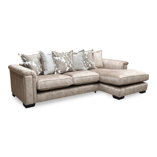 Full View DFS ‘Dolcie’ 3-seat chaise sofa, right hand facing orientation, beautifully upholstered in luxurious caramel combination Dolcie velvet with a relaxed, casual pillow back configuration.