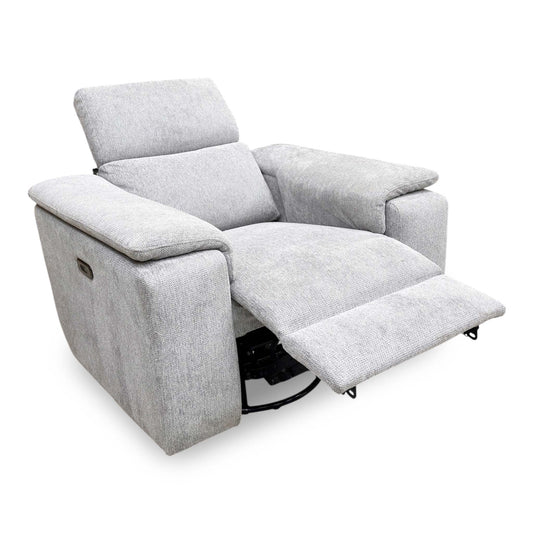 Full view of the Nicoletti ‘Davide’ power recliner armchair in light grey fabric, showcasing its contemporary Italian design and premium upholstered finish.