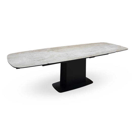 Full view of the Catalina large extending dining table featuring a premium grey ceramic top with a marble-effect finish and a contemporary black cross-frame metal base.