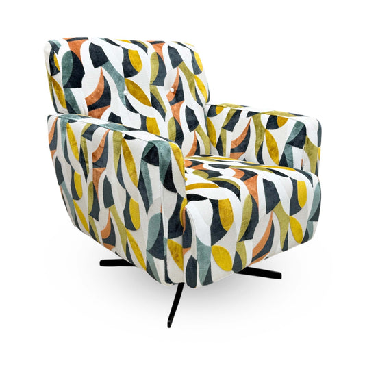 Full view of the Furniture Village ‘Hedingham’ Swivel Accent Chair in Audley Terrazzo patterned fabric, showcasing its curved barrel silhouette, deep cushioning, and modern rotation base.