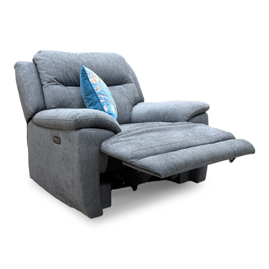Full view of the Touch power recliner armchair in dove grey fabric, featuring a contemporary silhouette, deeply padded split-back cushions, and tailored armrests.