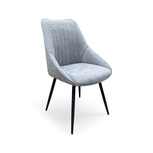 Full View ‘Crete’ contemporary swivel dining chair, beautifully upholstered in a sophisticated, textured Silver fabric with clean, modern lines.