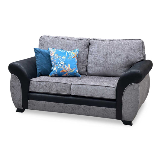 Full View ‘Narva’ 2-seater sofa, beautifully designed with a dual-material finish featuring textured grey fabric cushions over a sleek grey faux leather base framework.