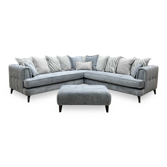 Front-facing view of the Farrah corner sofa suite, highlighting the expansive seating layout, plush scatter back cushion arrangement, and clean symmetrical design.