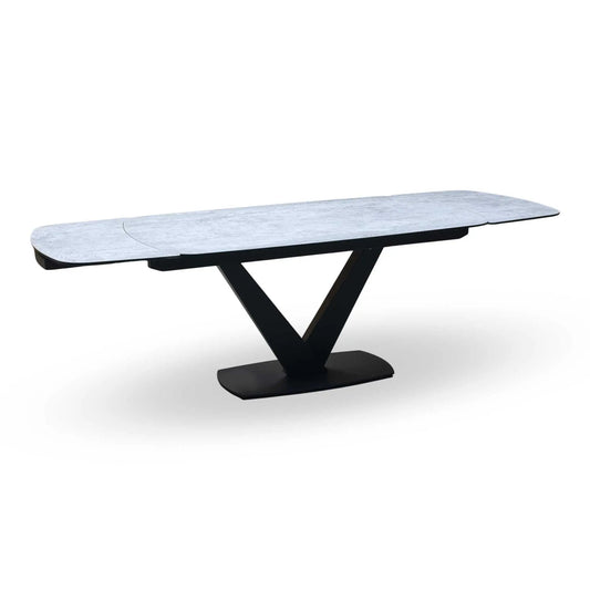 Full View ‘Julio’ ultra-modern 160cm draw-leaf extending dining table, featuring a sleek silver grey ceramic top surface paired with a dramatic contemporary black metal base.