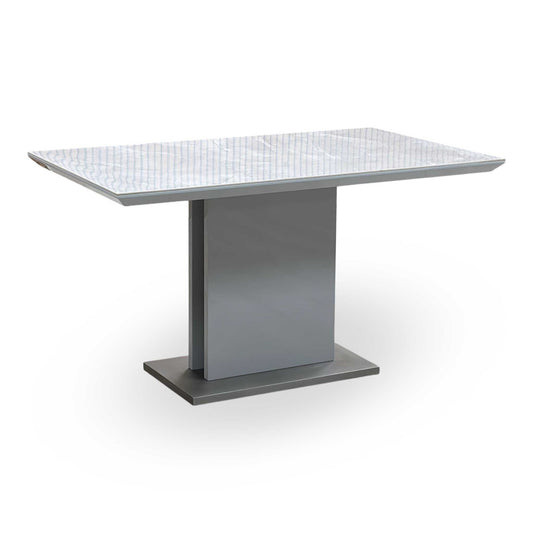 Full View ‘Grigio’ contemporary fixed dining table, featuring a sleek, high-end Ceramic top surface mounted upon a bold, architectural geometric metal base.