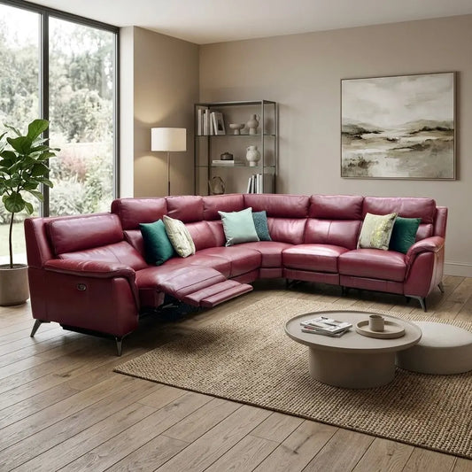 Styled upscale contemporary living room lifestyle layout featuring the Contempo burgundy red leather XL modular corner sofa arranged as a luxurious, commanding home theater and family lounge hub.