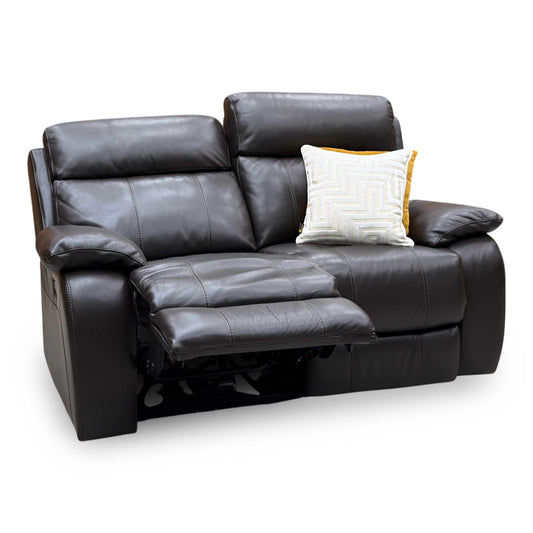 Moreno dark chocolate brown leather 2 seater power recliner sofa, angled view with the left seat reclined