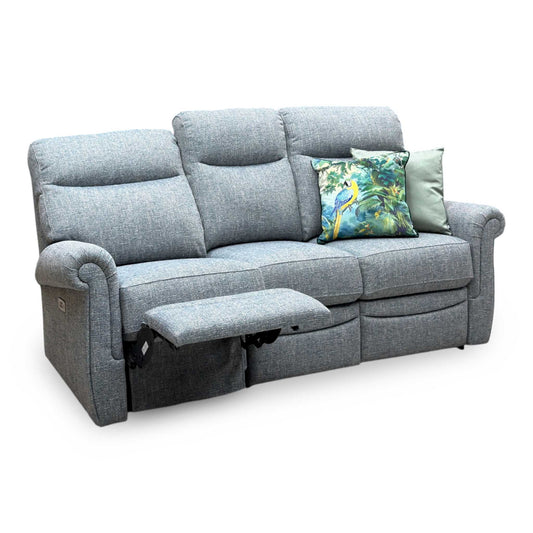 G Plan Avon Dapple Kingfisher blue fabric 3 seater power recliner sofa, angled view with left seat reclined