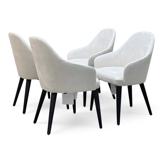Stone International Blade set of 4 white suede fabric dining chairs with black tapered legs, angled view