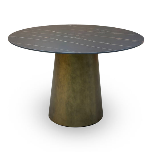 Osiris golden black sintered stone 120cm round dining table with tapered bronze pedestal, front view