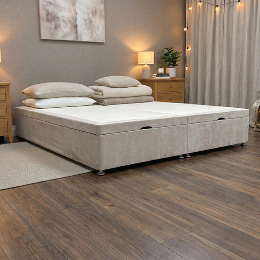 bedroom view for the Finesse King Size Ottoman base, highlighting the durable Oatmeal woven fabric, double-end lift access, and massive under-bed storage capacity.