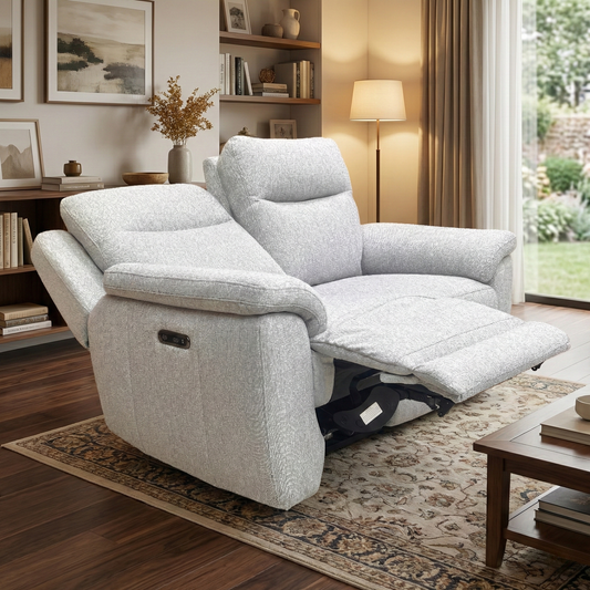 Living room view of the stone grey 2-seater sofa, highlighting the sleek modern armrests and tight weave upholstery.