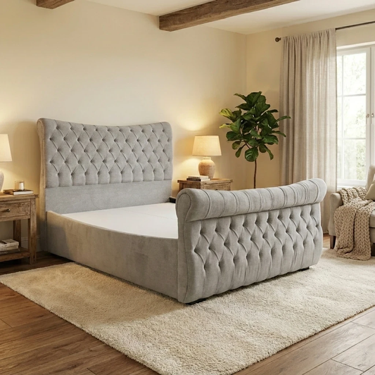Living Room view of the sleigh bed highlighting the curved footboard and the textured velvet upholstery.